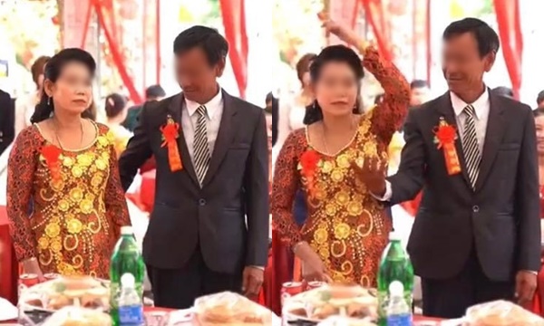 Thái độ lạnh lùng gây ngượng ngùng của người mẹ trong hôn lễ con trai