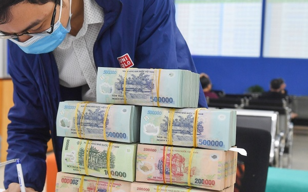 Nhận thưởng Tết 2026 bao nhiêu phải đóng thuế thu nhập cá nhân?