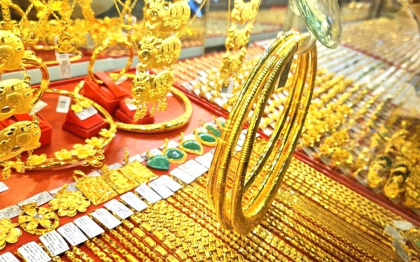 Giá vàng lao dốc về sát 5.000 USD/ounce, dự báo 