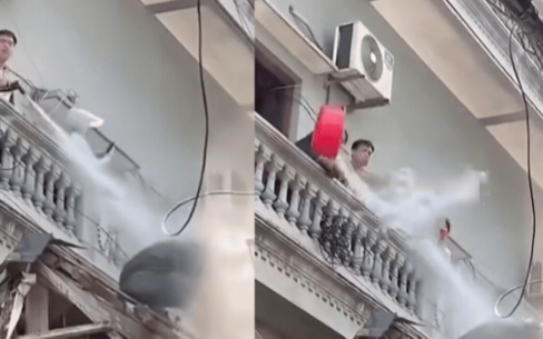 Người đàn ông xịt nước vào thợ xây nhà hàng xóm: Đã rõ nguồn cơn sự việc