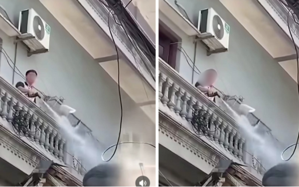 Vụ người đàn ông xịt nước vào thợ xây nhà hàng xóm: Hành vi có thể bị xử lý thế nào?